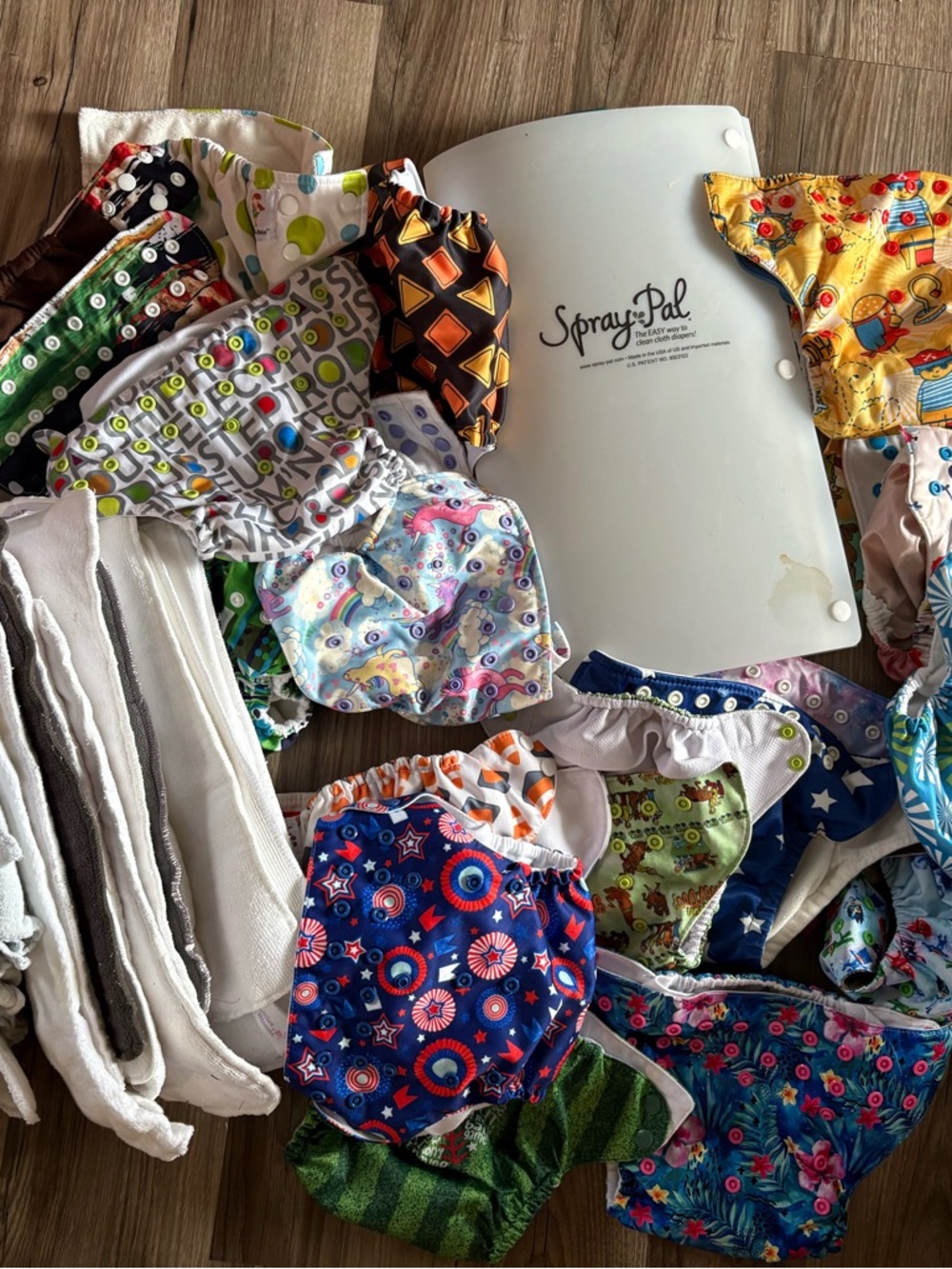 Diaper Sprayer Shield with 18 Cloth diapers and multiple liners